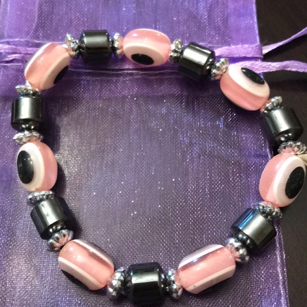 Pink and hematite evil eye bracelet